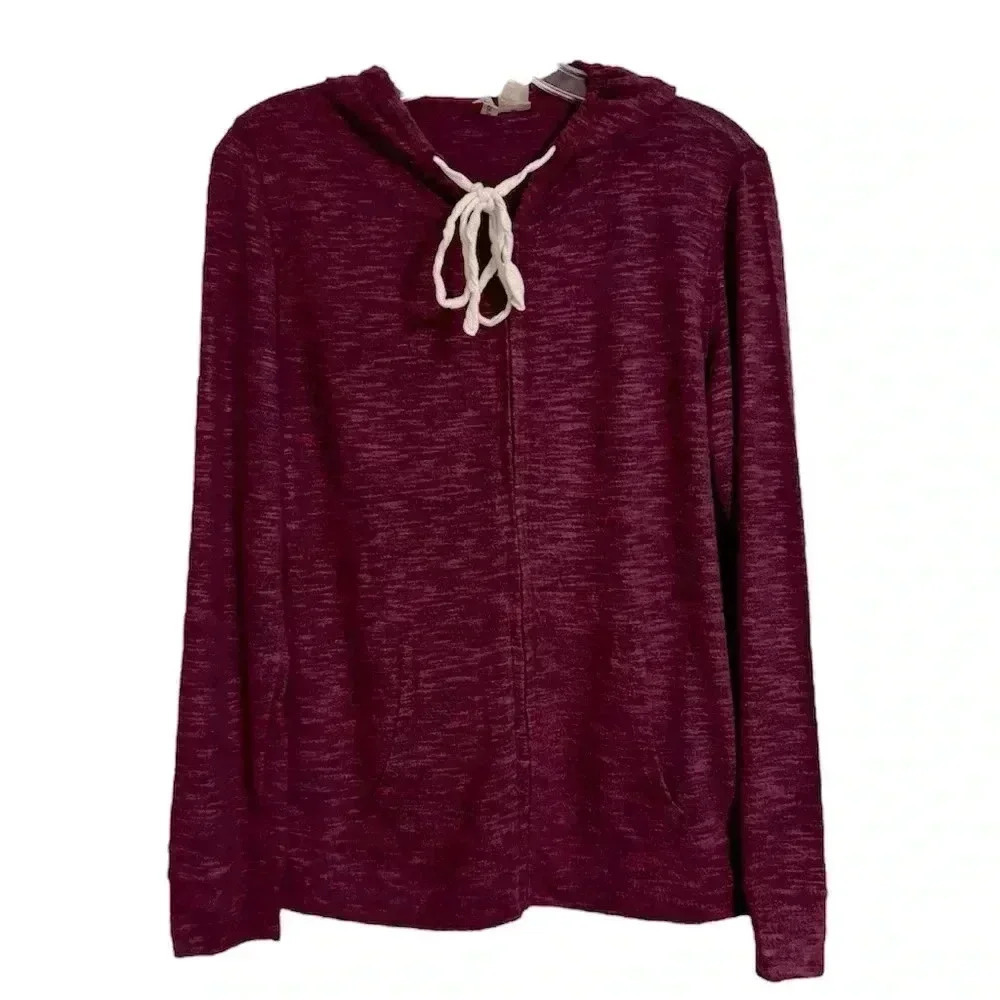 Just be Free cozy hoodie Size Medium features a stylish lace-up.